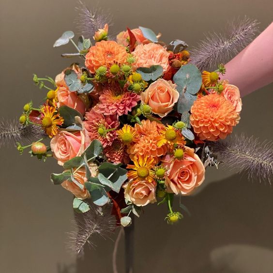 Oransje blomsterbukett